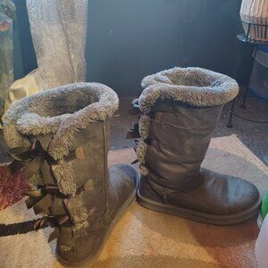 UGG Tall boots Grey with bows on back of boots .
